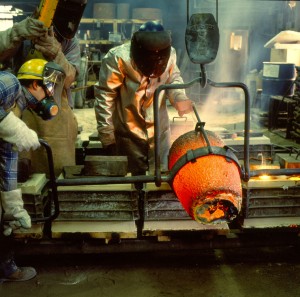 Molds Being Poured out of Brass